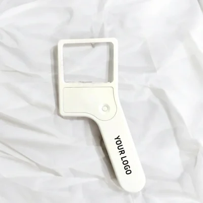 Buy Mini Magnifier with Built-in Torch in bulk for Corporate Gifting | Corporate Gyft