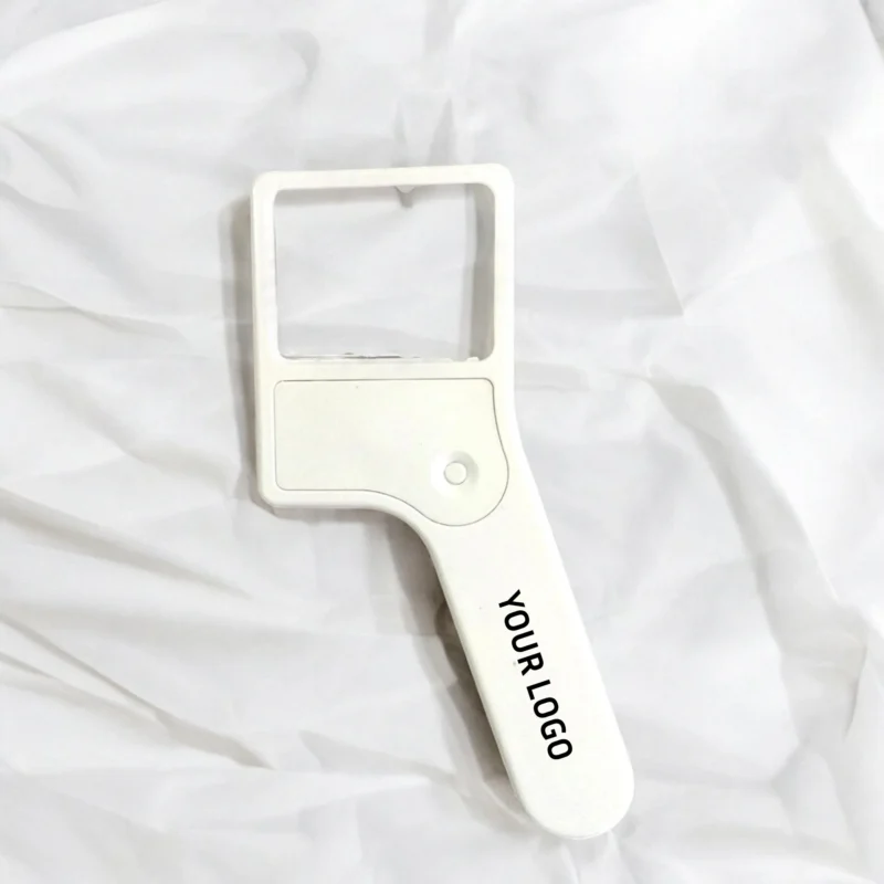 Buy Mini Magnifier with Built-in Torch in bulk for Corporate Gifting | Corporate Gyft