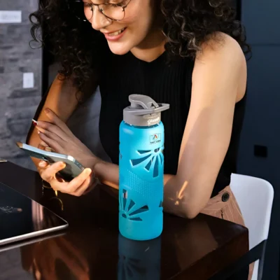 Buy Clear Grip Bottle with Silicone Sleeve - Teal in bulk for Corporate Gifting | Corporate Gyft