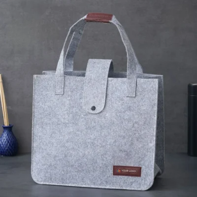 Buy Recycled Felt Light Grey Hand Bag in bulk for Corporate Gifting | Corporate Gyft