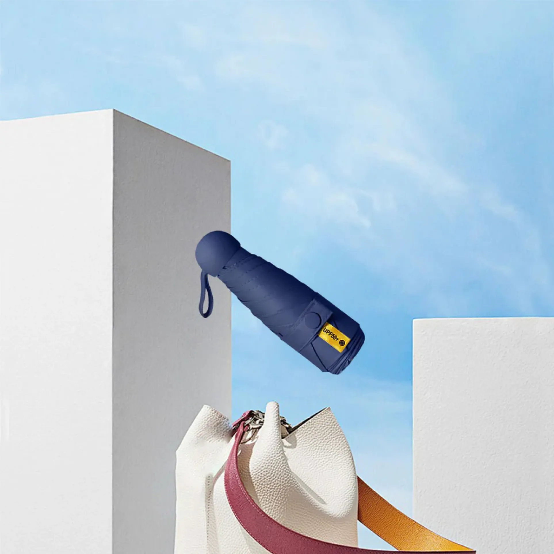 Capsule Mini Umbrella - Blue Buy Capsule Mini Umbrella - Blue in bulk for Corporate Gifting | Corporate Gyft